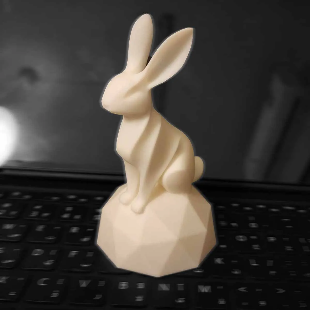 Minimalist rabbit sculpture produced with professional 3D printing for decorative purposes.